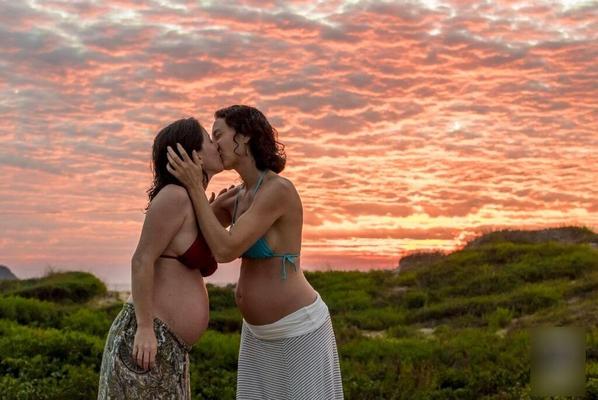 Two lesbians pregnant by the same man