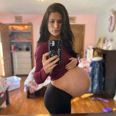 Pregnant brunette