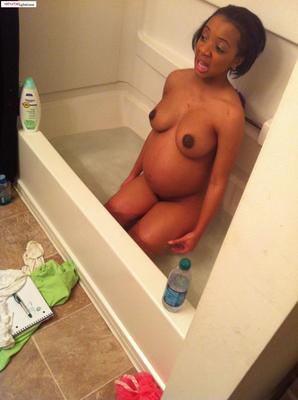 Pregnant black girl in the shower