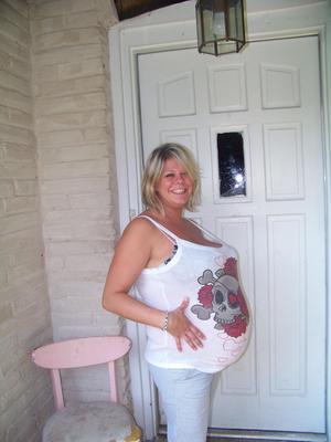 hot preggo milf with big belly and hangers